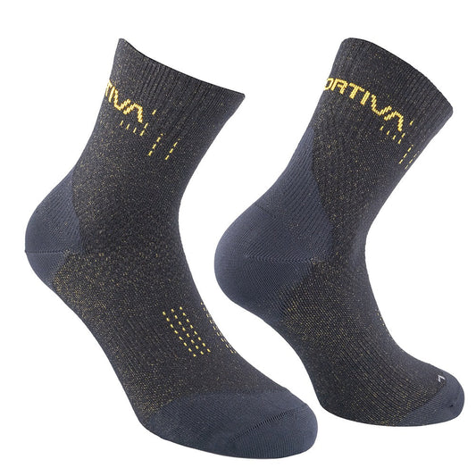 La Sportiva Sprint Trail Socks: Dark gray ankle-length socks with yellow patterns and text, shown on a white background. Made from breathable, textured fabric—ideal for trail runs and short-distance sprints needing speed.